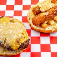 Fat Eagle · Burger, chicken fingers, mozzarella sticks, fries, honey mustard.