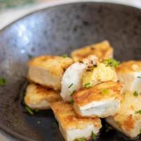 Agedashi Tofu · Fried and served with a light broth with scallions.