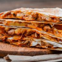 Chicken Parmesan Quesadilla · Grilled tortilla filled with breaded chicken, fresh mozzarella, marinara sauce, basil and Pa...