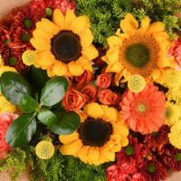 Vintage Bouquet · Sunflowers surrounded by colorful mixed flowers and spray roses.  Colors may vary by availab...