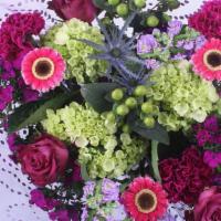 Couture Bouquet · Mini Green hydrangeas, picolinin gerbera daisies, roses and mixed flowers. Colors may vary b...