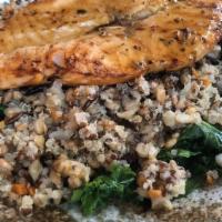 Salmon Bowl With Grains & Greens · A heaping bowl of leafy kale and collard greens with wheat berries, barley, quinoa and wild ...