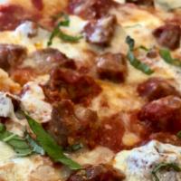 Meatball Parm Slice · House made fresh meatballs, fresh mozzarella, parmesan, basil.