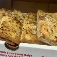 Sq Garlic Bread - 2 Squared · Garlic, parmesan and e.v.o.o. with our bread made with Italian flour!