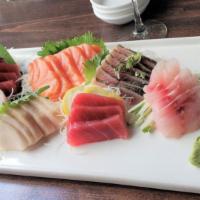 House Sashimi · 18 pieces of assorted sashimi. Served with choice of soup or salad. Served with choice of so...