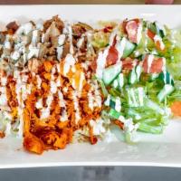 Combo Over Rice · Served with any of Shah's sauces and it comes with lettuce, mix salad (cucumbers, tomatoes a...