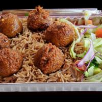 Falafel Over Rice · Served with any of Shah's sauces and it comes with lettuce, mix salad (cucumbers, tomatoes a...