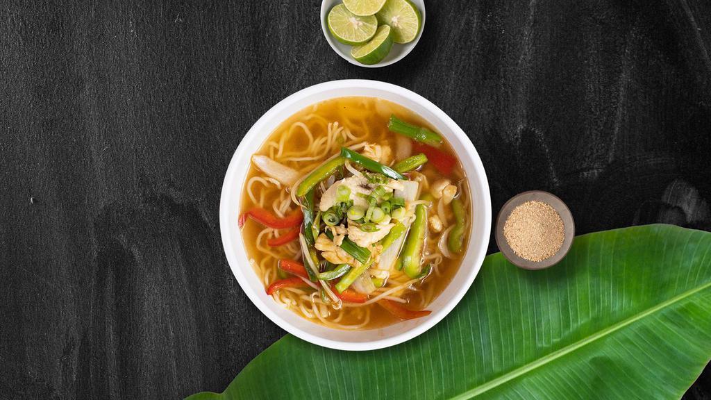 Loco Coco Noodle Soup · Rice noodle, carrot, onion, garlic, broccoli, kaffir lime leaf, lemongrass, galangal, Tom Yam chili paste, fried garlic, lime and coriander in a creamy coconut broth. Gluten free.