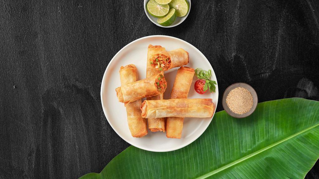 Fresh Spring Rolls · Mixed greens, lettuce, carrot, cilantro, ginger, cucumber and avocado wrapped in rice wrapper and served with peanut sauce or tamarind sauce.