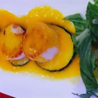 Mango Grilled Scallops · Gluten-free. Scallops grilled and flavored with fresh mango sauce.