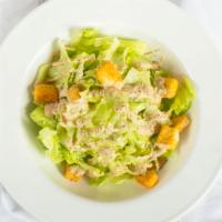 Caesar Salad · Romaine, fresh Parmesan, garlic.