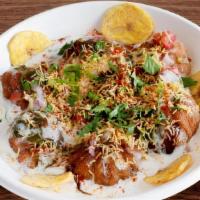 Chaat Momo · Spicy. Fried momo mixed with yogurt, spicy tangy tamarind chutney, green chutney, onion, and...