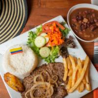 Carne Asada, Arroz, Maduros, Papa Frita, Ensalada Sopa O Frijoles · Sirloin steak, rice, sweet plantains, fries, salad, soup, or beans.