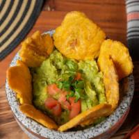 Guacamole Con Arepa O Tostones · Guacamole with your choice of arepa or green plantains.
