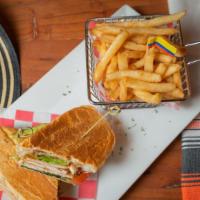 Sandwich De Pollo · Chicken Sandwich with lettuce ,tomato , cheese, and French Fries