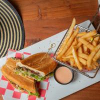 Sandwich De Carne Asada · Beef Steak Sandwich with lettuce ,tomato , cheese, and French Fries