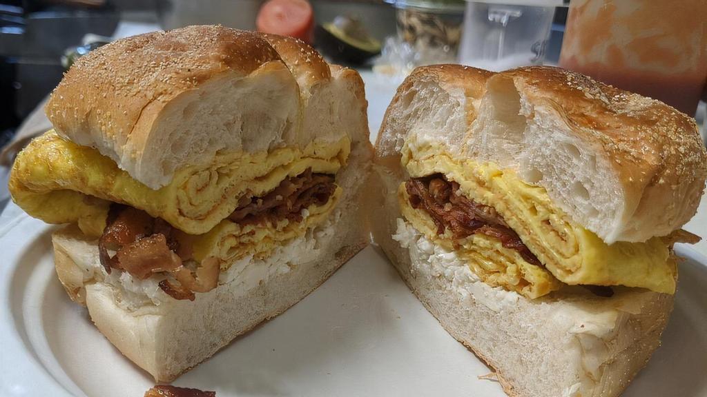 #B4. Bacon, 2 Eggs, Cheese · on a Bagel or Roll.
