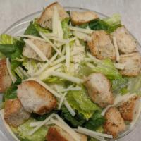 Grilled Chicken Caesar Salad · Fresh Romaine, Shaved Parmesan Cheese, Garlic Croutons with Caesar Dressing, Topped with Gri...