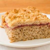 Raspberry-Walnut Crumb Cake · Rich butter crumbs top a layer of quality preserves moist walnut base excellent coffee or de...