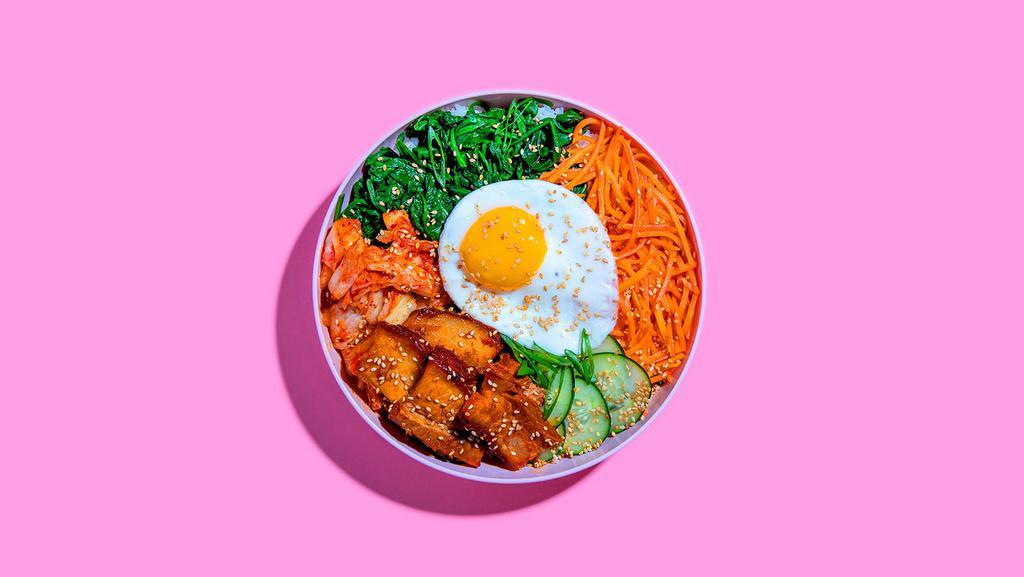 Pork Belly Bibimbap · Pork belly with white rice, kimchi, shredded carrots, cucumber, scallions, sesame seeds, fried egg, and gochujang.