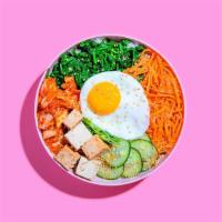 Tofu Bibimbap · Tofu with white rice, kimchi, shredded carrots, cucumber, scallions, sesame seeds, fried egg...