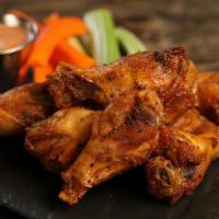 Cajun · 8 Cajun dry rub wings* (mild heat), served with carrots & celery and a choice of blue cheese...