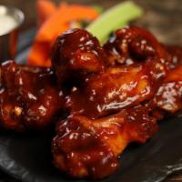 Classic Bbq · 8 BBQ wings* (mild heat), served with carrots & celery and a choice of blue cheese, classic ...