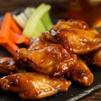Hot Honey · 8 hot honey wings* (medium heat), and a choice of blue cheese, classic ranch, for dipping