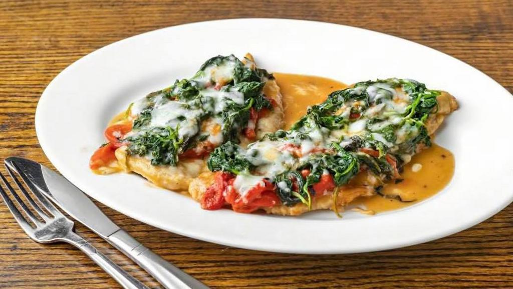Chicken Monte Bianco · with spinach, roasted peppers & mozzarella cheese in a marsala wine sauce.