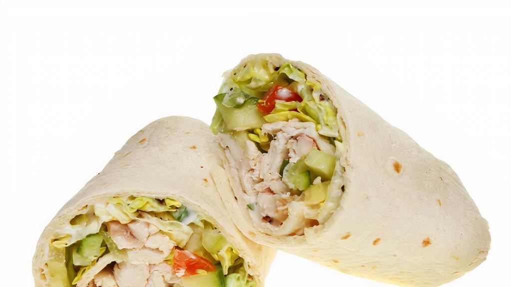 Chicken Caesar Wrap · Delicious Wrap made with Grilled chicken, romaine, croutons, Parmesan cheese and Caesar dressing.