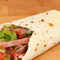 Turkey Blt Wrap · Delicious Wrap made with Turkey breast, customer's choice of bacon, lettuce, tomato and mayo.