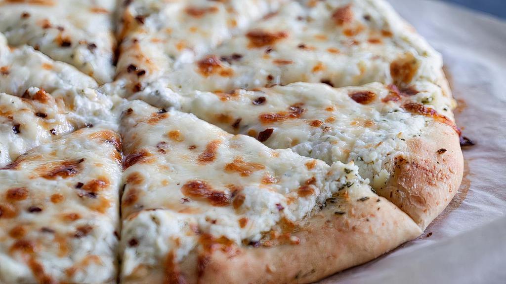 White Ricotta Pizza Pie · Mozzarella and ricotta cheeses and fresh basil. (No
marinara sauce).