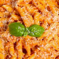 Penne Ala Vodka · Penne style pasta it or with famous vodka sauce
