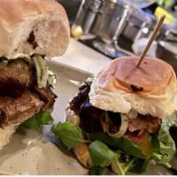 Slow Roasted Brisket Sliders · Herbed Shallots | Creamy Grain Mustard | Pikled Cherry Peppers | Watercress