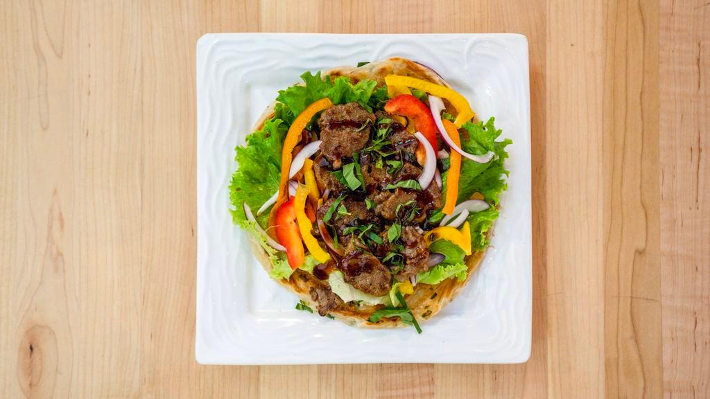 Bulgogi Beef Bing · Crunchy scallion pancake wrapped with fresh vegetables and bulgogi beef