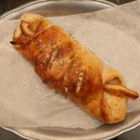 Chicken Roll · Pizza dough rolled with breaded chicken cutlet and mozzarella cheese. Served with side of fr...