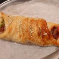 Sausage & Pepper Roll · Fresh Italian sausage with peppers, and onions. Add sauce, topping for an additional charge.