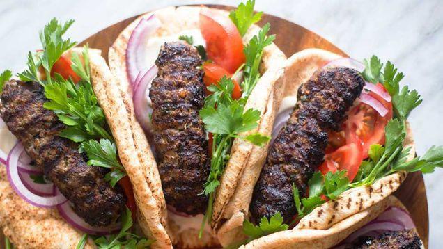 Kofta Kabab (Ground Lamb Or Beef) · Ground lamb or beef marinated in fresh parsley, onions and grated spices. Broiled over natural charcoal. Served with basmati rice or hummus and pita bread.
