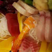 Chirashi · 11 pieces of chef choice of sashimi over sushi rice.