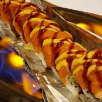 Volcano · Two pieces spicy tuna, two pieces spicy salmon and two pices spicy kani, lightly seared. Ser...