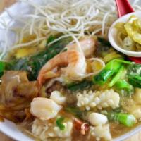 Cantonese Chow Fun 广东滑蛋河米 · Wok-fried broad rice noodles and rice vermicelli, shrimp, calamari, pork, and bok choy in ta...