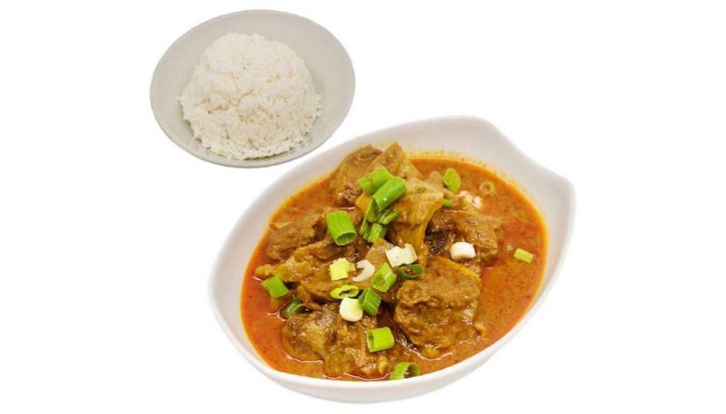 Wok Wok Curry Beef Stew Over Rice 咖喱牛腩饭 · Spicy. Famous curry beef flank stew.