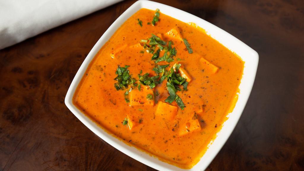 Paneer Butter Masala · Fresh cottage cheese cubes cooked in mildy spiced creamy tomato sauce and butter ( chef special ).