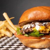 Bud'S Hamburger · Juicy grilled beef burger smashed to perfection on a toasted potato bun with fresh lettuce, ...