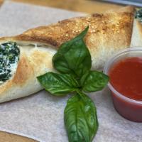 Spinach Roll · Roll stuffed with spinach and mozzarella.