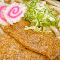 Kitsune Udon Soup · Sweet soy sauce marinaded fried tofu pouch, udon noodles in clear broth. A classic and basic...
