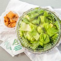 Caesar Salad · Romaine lettuce, parmesan, crispy croutons and caesar dressing.