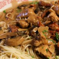 Chicken Balsamico · Diced chicken breast sautéed w/ mushroom, sun-dried tomatoes, tossed in a delicate crème bal...