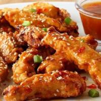 Sweet Chili Chicken Tender · Sweet and spicy chicken tenders. (4 tenders)