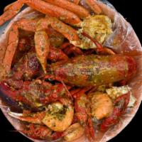 Oceanic Combo · 1 lb shrimp (HEADLESS), 1 lb crawfish, 1 lb snow crab leg, and whole lobster. Served with co...